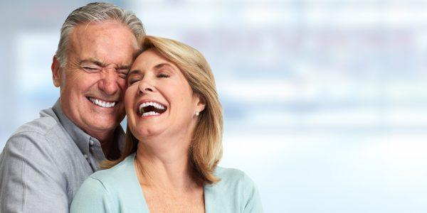 Same Day Dentures - Older Couple Laughing
